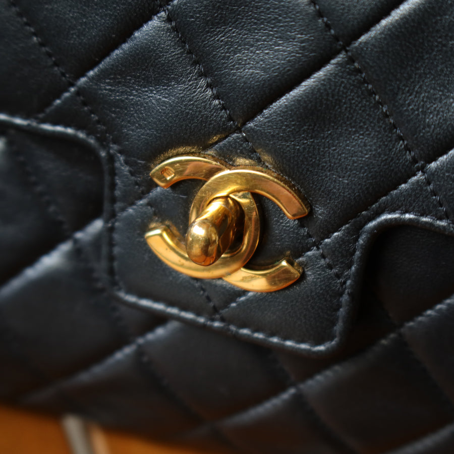 Vintage_Chanel_Black_Lambskin_Matelasse_Turn_lock_Mini_Bag