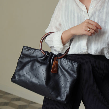 Chanel Vintage Black Lambskin Stitched Wood Resin Top Handle Weekend Bag