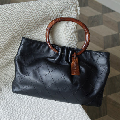 Chanel Vintage Black Lambskin Stitched Wood Resin Top Handle Weekend Bag