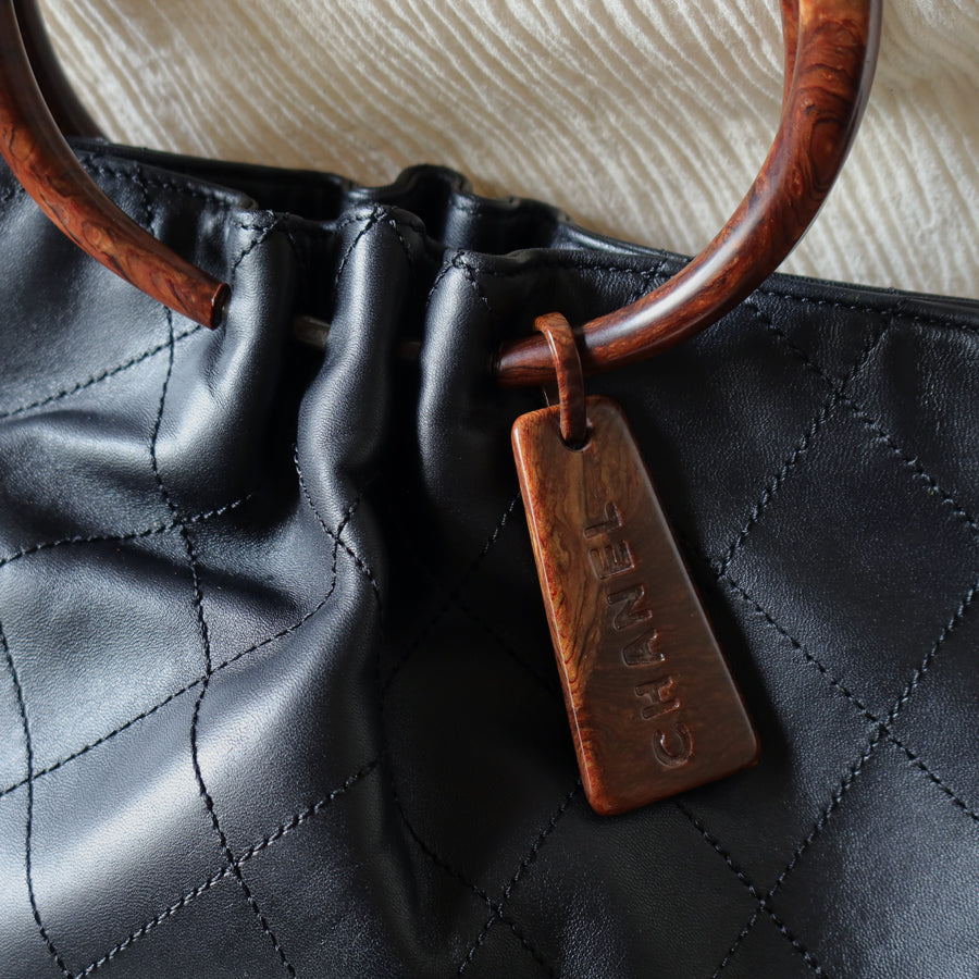 Chanel Vintage Black Lambskin Stitched Wood Resin Top Handle Weekend Bag