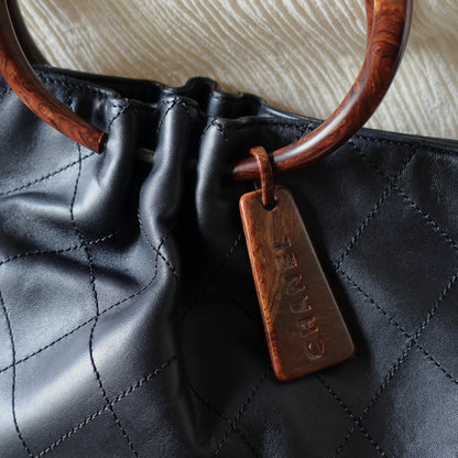 Chanel Vintage Black Lambskin Stitched Wood Resin Top Handle Weekend Bag