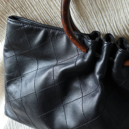 Chanel Vintage Black Lambskin Stitched Wood Resin Top Handle Weekend Bag