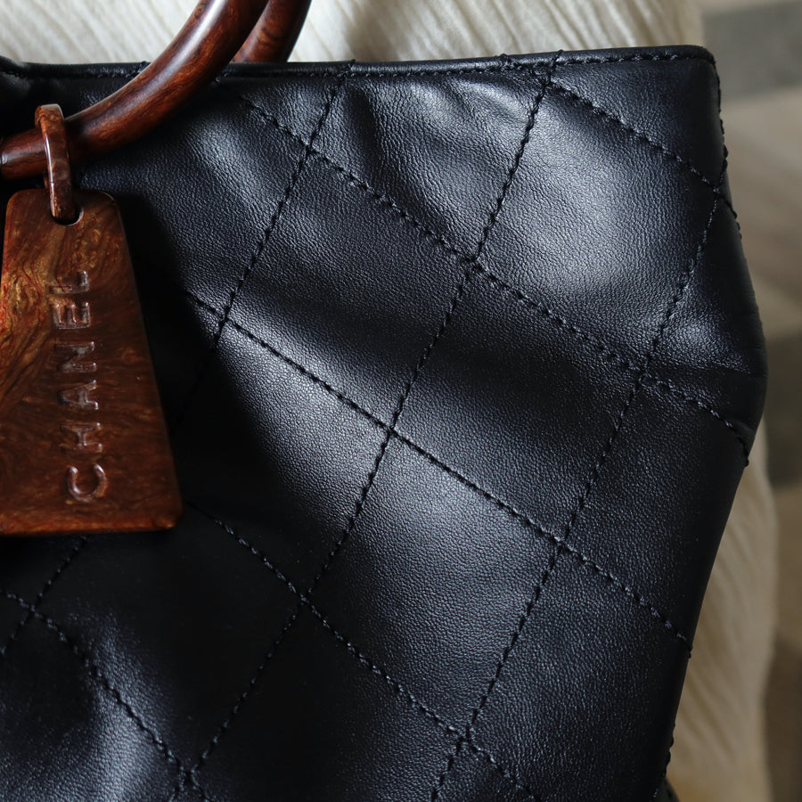 Chanel Vintage Black Lambskin Stitched Wood Resin Top Handle Weekend Bag