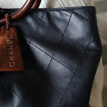 Chanel Vintage Black Lambskin Stitched Wood Resin Top Handle Weekend Bag