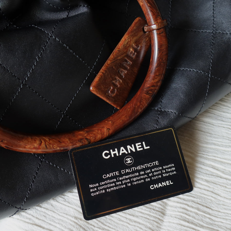Chanel Vintage Black Lambskin Stitched Wood Resin Top Handle Weekend Bag
