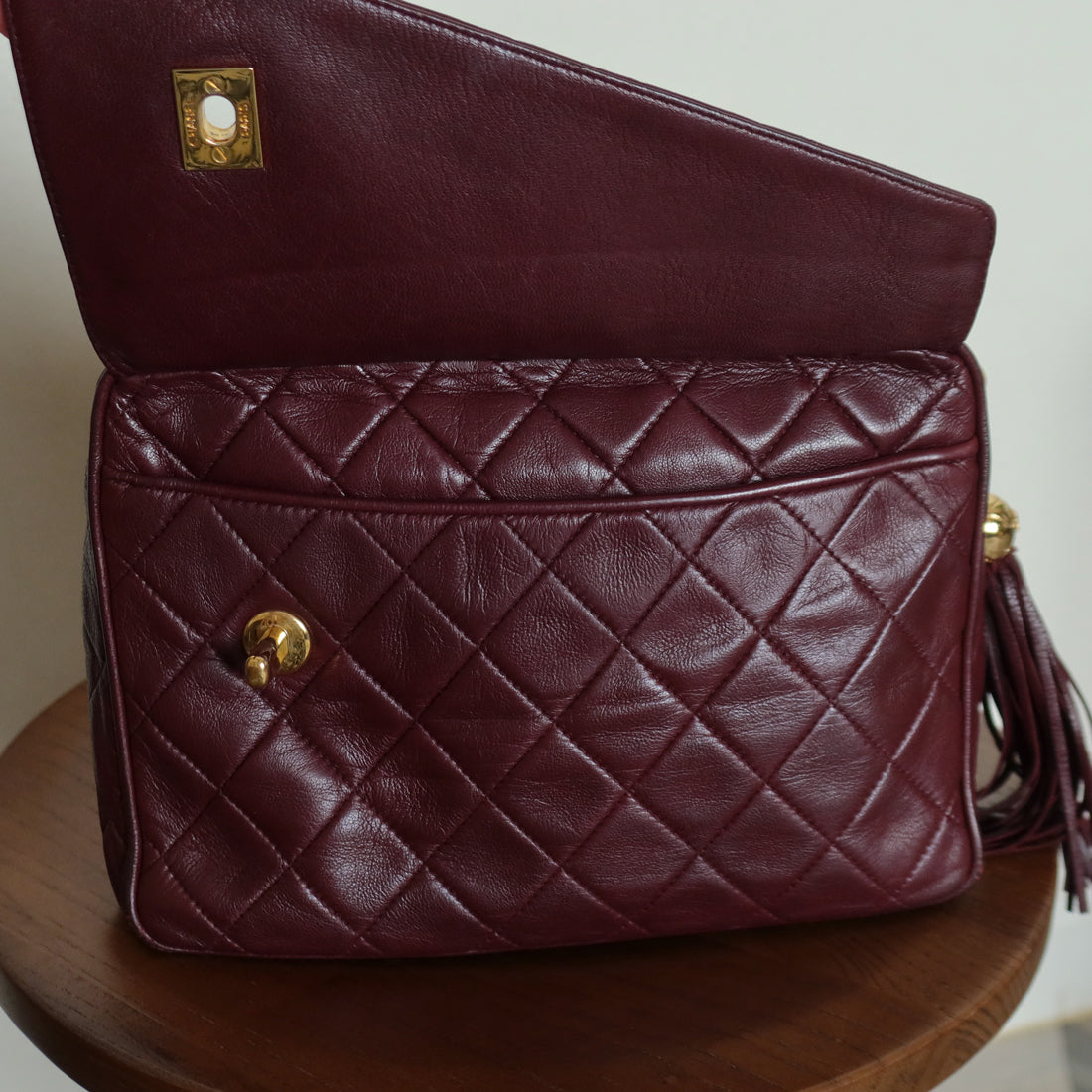 Vintage Chanel Burgundy Lambskin Diamond Quilted CC Tassel Bijoux Camera Bag