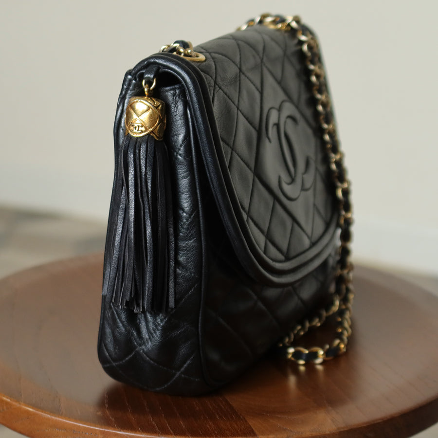 Vintage Chanel Black Lambskin Matelasse CC mark Tassel charm Classic Flap Bag