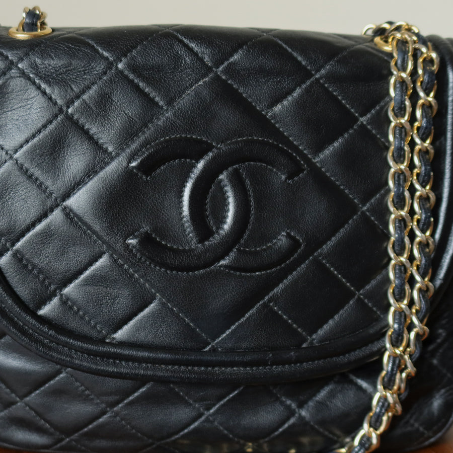 Vintage Chanel Black Lambskin Matelasse CC mark Tassel charm Classic Flap Bag
