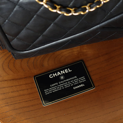 Chanel Vintage Black Lambskin 24k gold plated Tassel Asymmetrical Double Flap Bag M