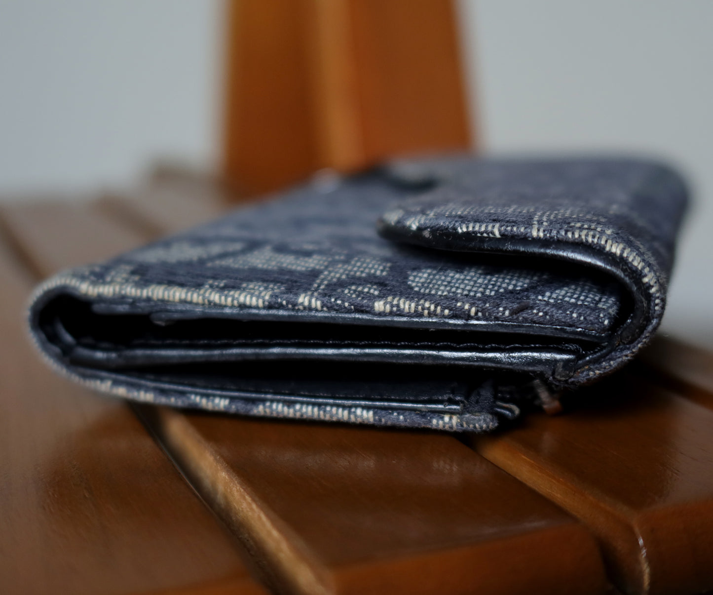 Christian Dior Pre-loved Black Trotter Oblique Jacquard Saddle Flap Wallet