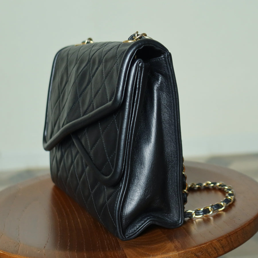 Chanel Vintage Black Matelasse Lambskin Asymmetrical Double Flap Bag with Tassel