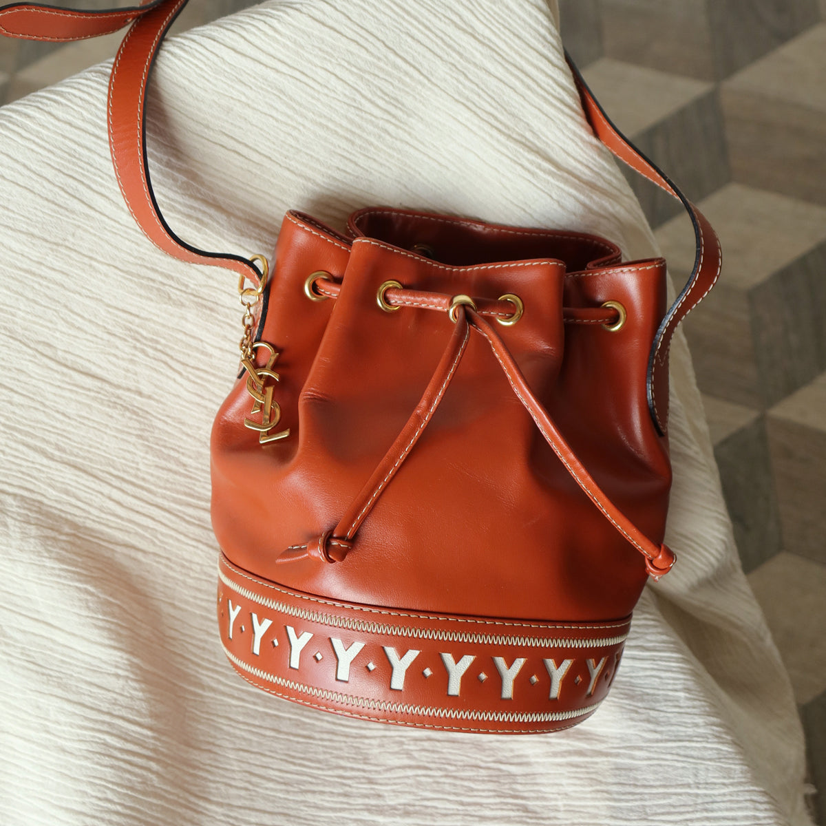 YSL Vintage Terracotta Brown Leather Bucket Shoulder Bag with YSL logo charm