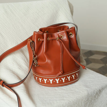 YSL Vintage Terracotta Brown Leather Bucket Shoulder Bag with YSL logo charm
