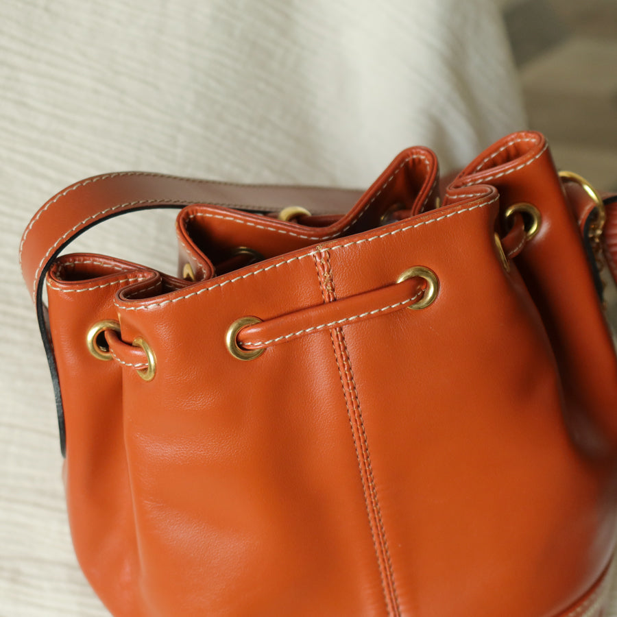 YSL Vintage Terracotta Brown Leather Bucket Shoulder Bag with YSL logo charm