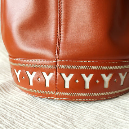 YSL Vintage Terracotta Brown Leather Bucket Shoulder Bag with YSL logo charm