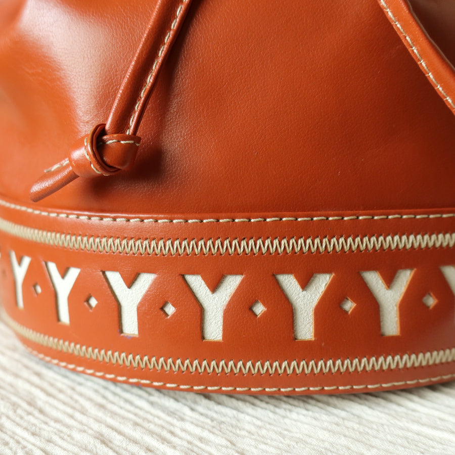 YSL Vintage Terracotta Brown Leather Bucket Shoulder Bag with YSL logo charm