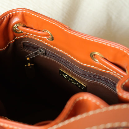 YSL Vintage Terracotta Brown Leather Bucket Shoulder Bag with YSL logo charm