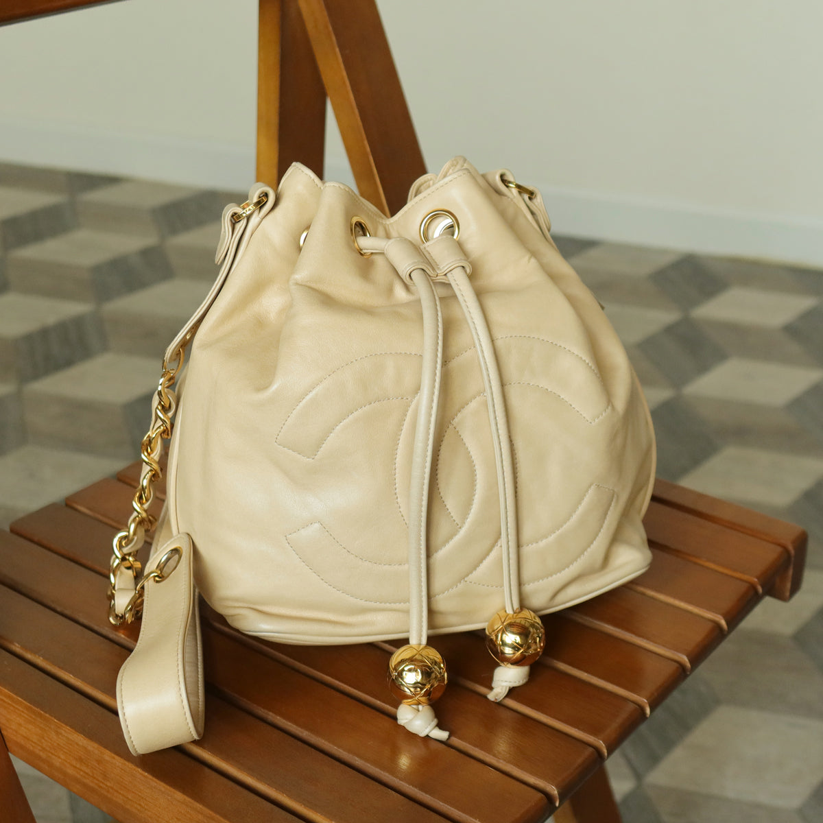 Chanel Vintage Beige Lambskin Coco mark Gold Ball Charm Crossbody Bucket Bag