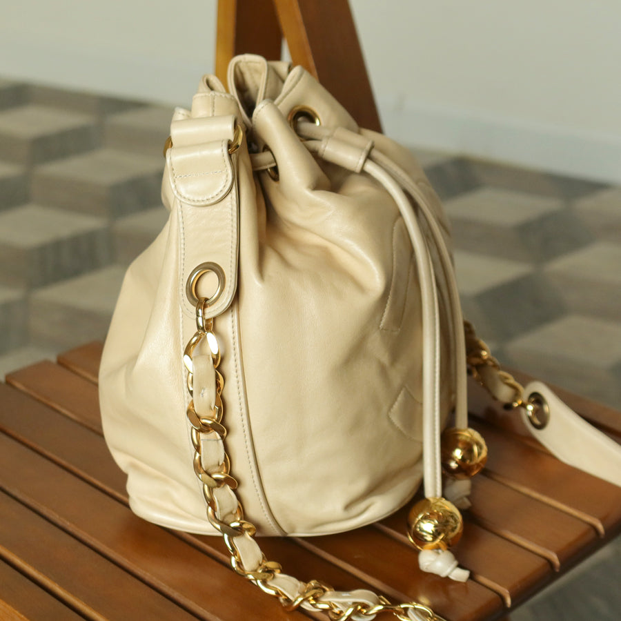 Chanel Vintage Beige Lambskin Coco mark Gold Ball Charm Crossbody Bucket Bag