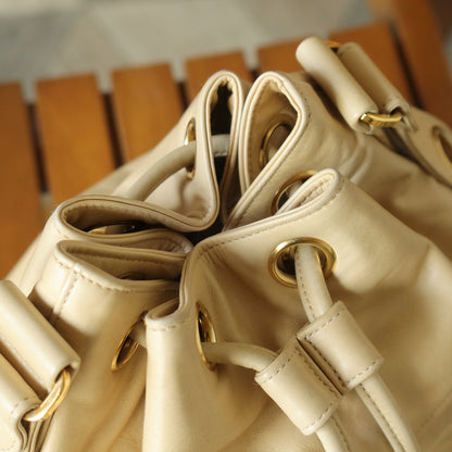 Chanel Vintage Beige Lambskin Coco mark Gold Ball Charm Crossbody Bucket Bag