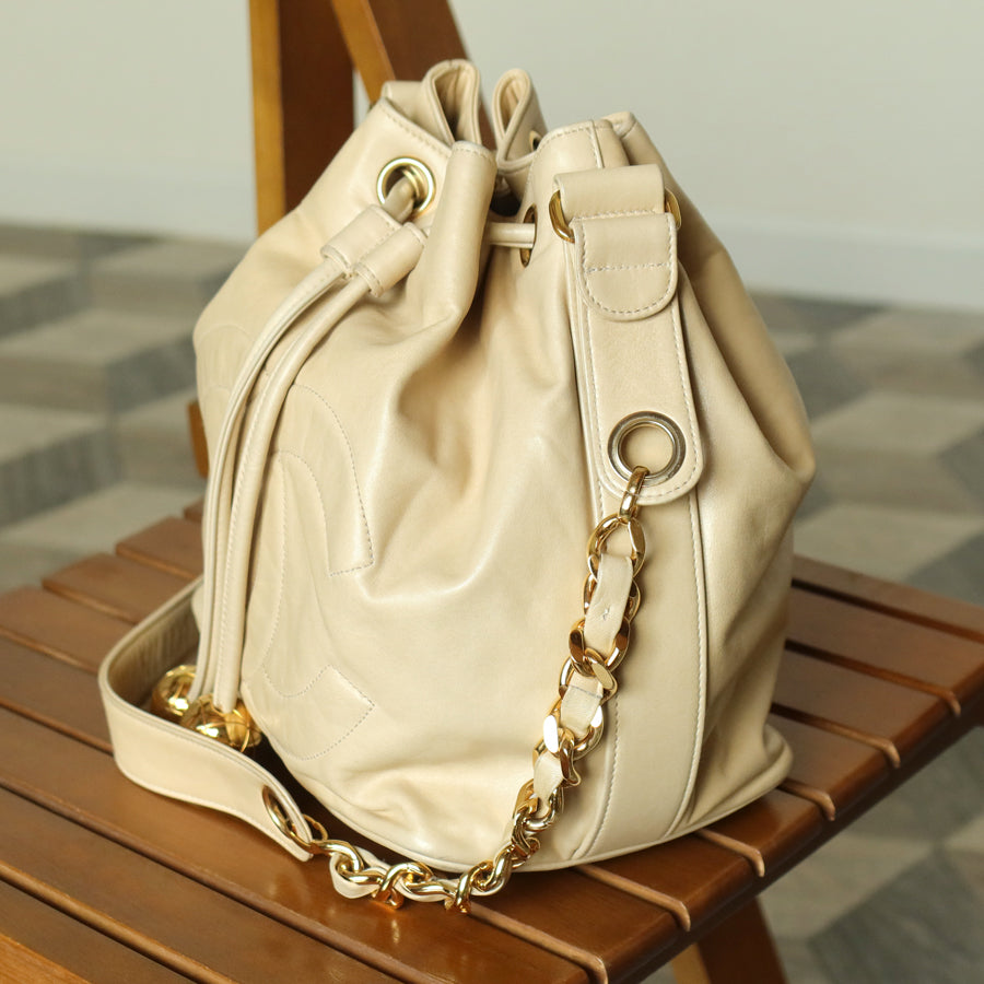 Chanel Vintage Beige Lambskin Coco mark Gold Ball Charm Crossbody Bucket Bag