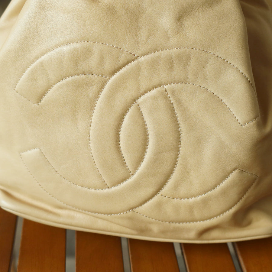 Chanel Vintage Beige Lambskin Coco mark Gold Ball Charm Crossbody Bucket Bag