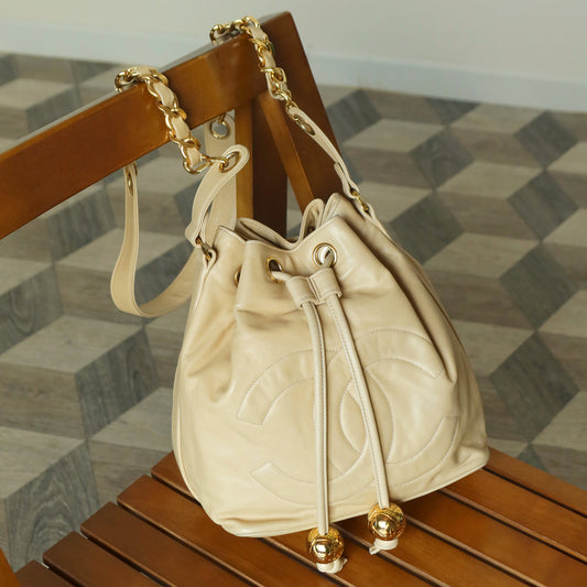 Chanel Vintage Beige Lambskin Coco mark Gold Ball Charm Crossbody Bucket Bag