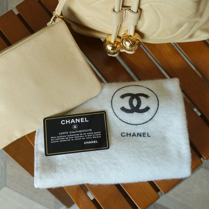 Chanel Vintage Beige Lambskin Coco mark Gold Ball Charm Crossbody Bucket Bag