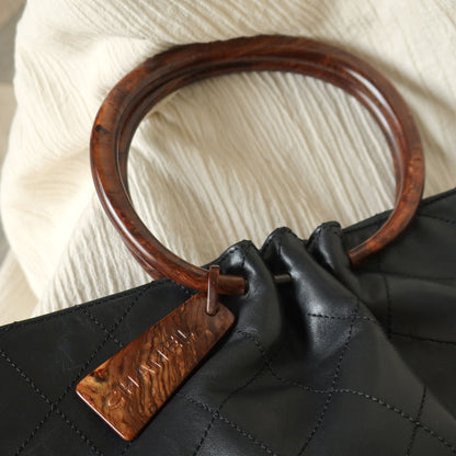 Chanel Vintage Black Lambskin Stitched Wood Resin Top Handle Weekend Bag N