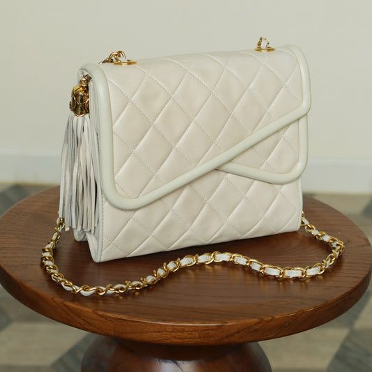Chanel Vintage Ivory Lambskin Tassel Diamond Stitched 24k Asymmetrical Double Flap Bag