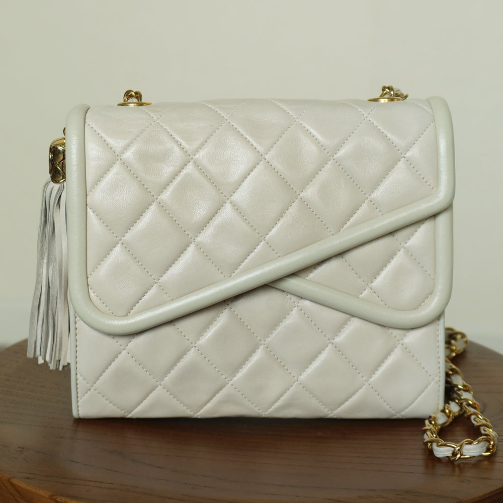 Chanel Vintage Ivory Lambskin Tassel Diamond Stitched 24k Asymmetrical Double Flap Bag