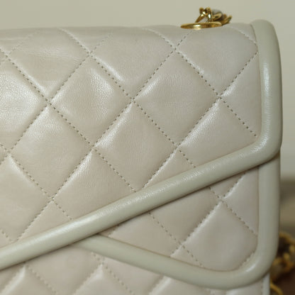 Chanel Vintage Ivory Lambskin Tassel Diamond Stitched 24k Asymmetrical Double Flap Bag