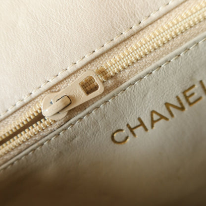 Chanel Vintage Ivory Lambskin Gold Tassel Asymmetrical Double Flap Bag S