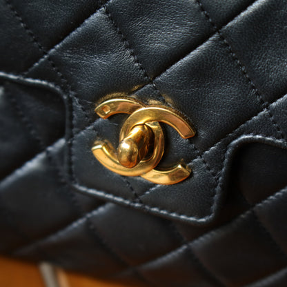 Vintage_Chanel_Black_Lambskin_Matelasse_Turn_lock_Mini_Bag