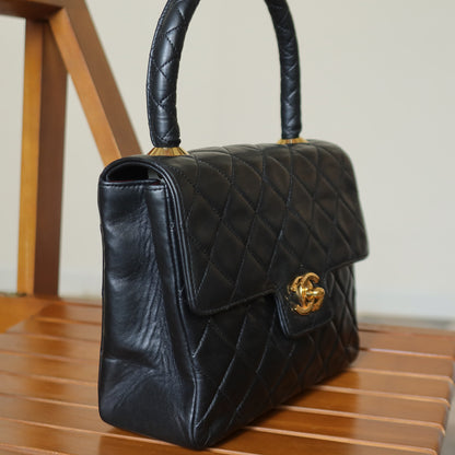 Vintage Chanel Black Lambskin Matelassé CC Turn lock Classic Mini Kelly Bag