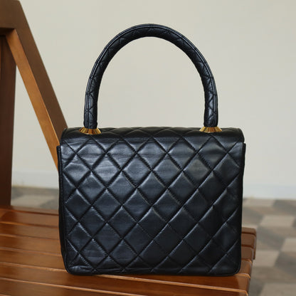 Vintage Chanel Black Lambskin Matelassé CC Turn lock Classic Mini Kelly Bag